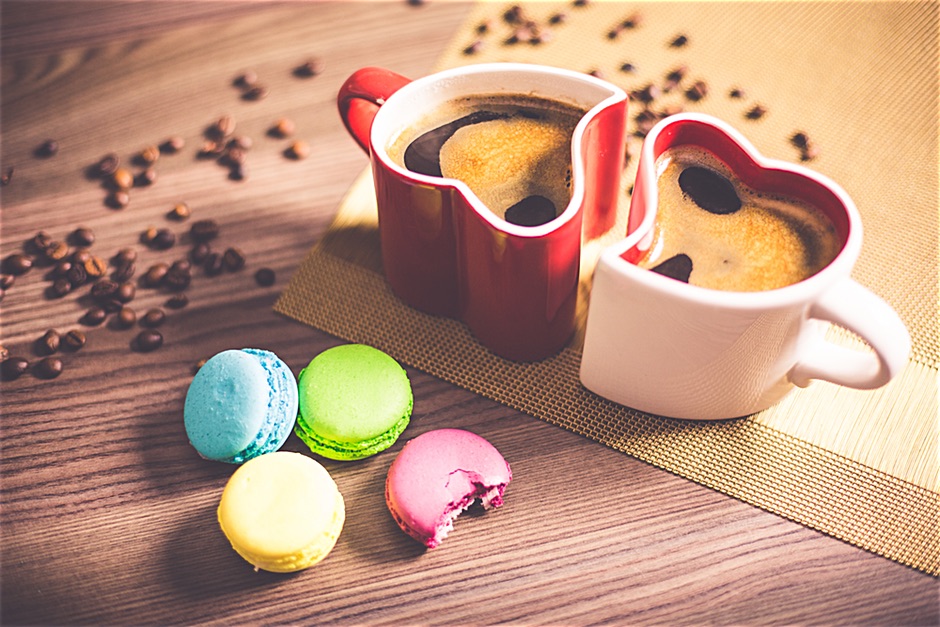 Coffee in Heart Cups and Sweet Yummy Macarons