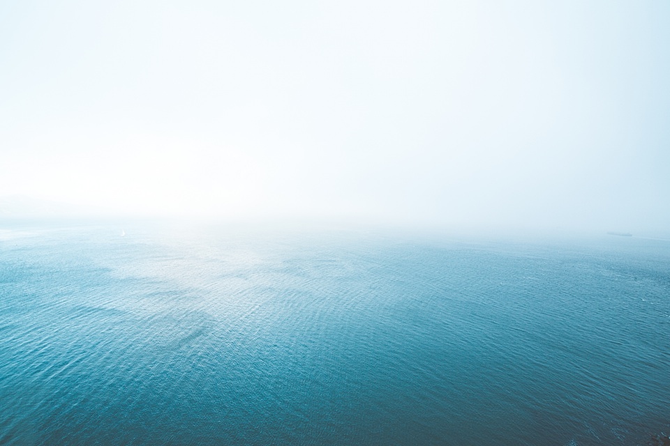 Blue Endless Ocean in Fog